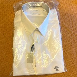 Never worn Calvin Klein Slim Fit performance non-iron dress shirt